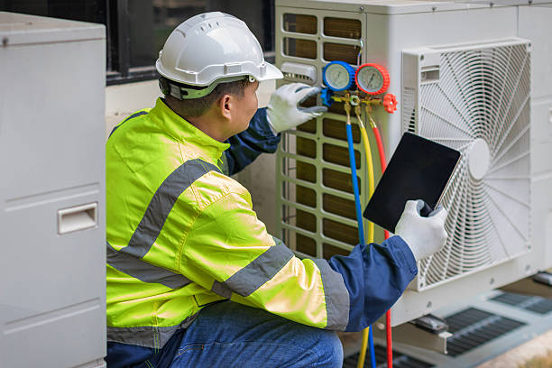 Professional Air Conditioning Repair technician working in Franklin, MA